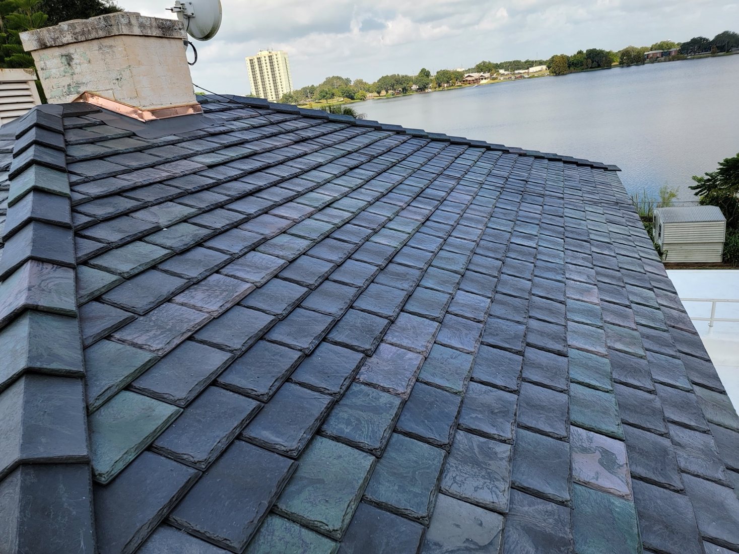 Slate roofing with chimney flashing details